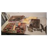 Tools- wrenches, files, screw drivers, scale