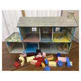 Vintage tin doll house with doll furniture