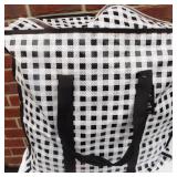 Reusable shopping bag filled with shopping bags