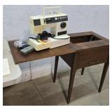 Singer Sewing machine & sewing cabinet