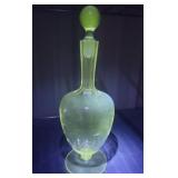 Glow glass - decanter - the stopper has a chip on