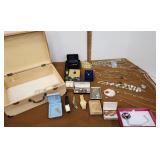 Wooden box of costume jewelry