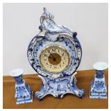 Ceramic clock with candlesticks