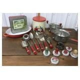 Red handled kitchen utensils, pan, tins, etc.