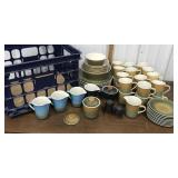 Blue crate full of Calypso China by Syracuse-