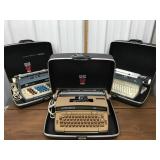 3 Smith-Corona typewriters