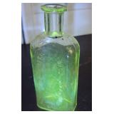 Green glow glass - Trumansburg NY bottle