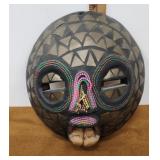 Wooden mask metal inlay and beads