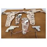6 cap guns Wyatt Earp Roy Rogers etc