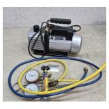 Rotary vacuum pump and gauges