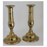 Early Pair push-up brass candlesticks