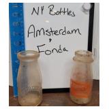 2 NY milk bottles - Amsterdam & Fonda - barn dirt
