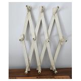 Early hat rack brass button