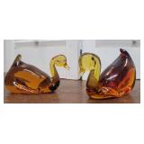 2 Amber glass swan paperweights