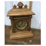 The American Wringer Company wood, wind up mantle