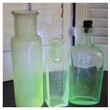 3 Glow green glass bottles - Frazier has a small