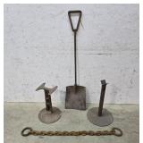 Cast iron bases, chain, shovel