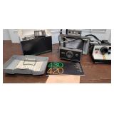 2 Polaroid cameras