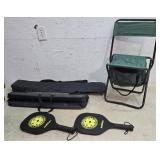 Cue stick bags, folding chair, pickleball paddles