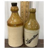 2 Stoneware bottles - 1 Lucas Bros. *has damage