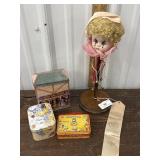 Hand painted porcelain clown head on a wooden