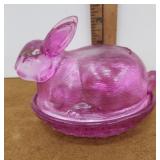 Purple rabbit on a nest