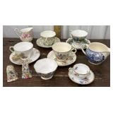 Mix set Cups and saucers, creamers and salt and
