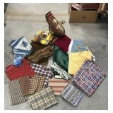 Fabric remnants, various sizes, some large,