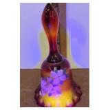 Painted Fenton bell glows
