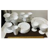 Assorted milk glass. Plates, cups, saucers,