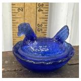 Mini cobalt blue hen on nest