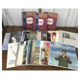 Record assortment & 3 Heartland cookbooks
