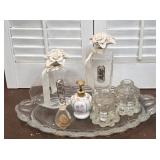 Glass tray with perfume bottles