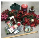 Christmas tree stand, tins, poinsettias, lights