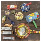 Vintage tin toys noisemakers