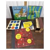 LP record set, piano rolls and music stand
