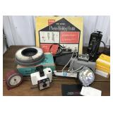 Cameras, tape recorder, flash bulb, slides,