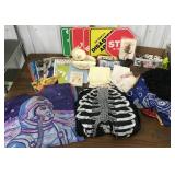 Costumes, toys, magazines, books, signs, etc in a