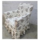 Upholstered chair with slip cover