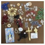 Box religious rosaries, coins, bracelets etcï¿½
