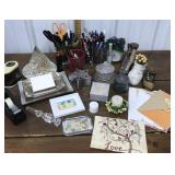 Pens, scissors, trinket dishes, ashtray, candle