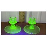 Pair glow green glass candle stick holders and