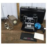 Minolta mini slide projector & Polaroid automatic