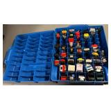 Hot wheels case with some cars and trucks and