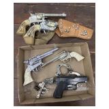 Toy guns and handcuffs - Ranger, Rodeo, 2 Fannner