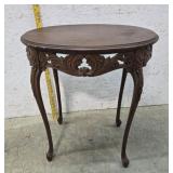 Oval carved stand 23"17"27"