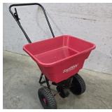 Grass seed spreader