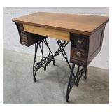 White sewing machine bases table