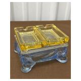 Cambridge blue cigarette box with two yellow