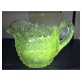 Glows green pitcher